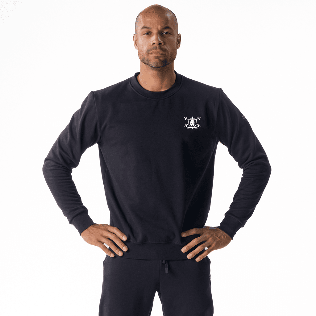 Zwarte sweater met het Castellum schildlogo klein op de borst
